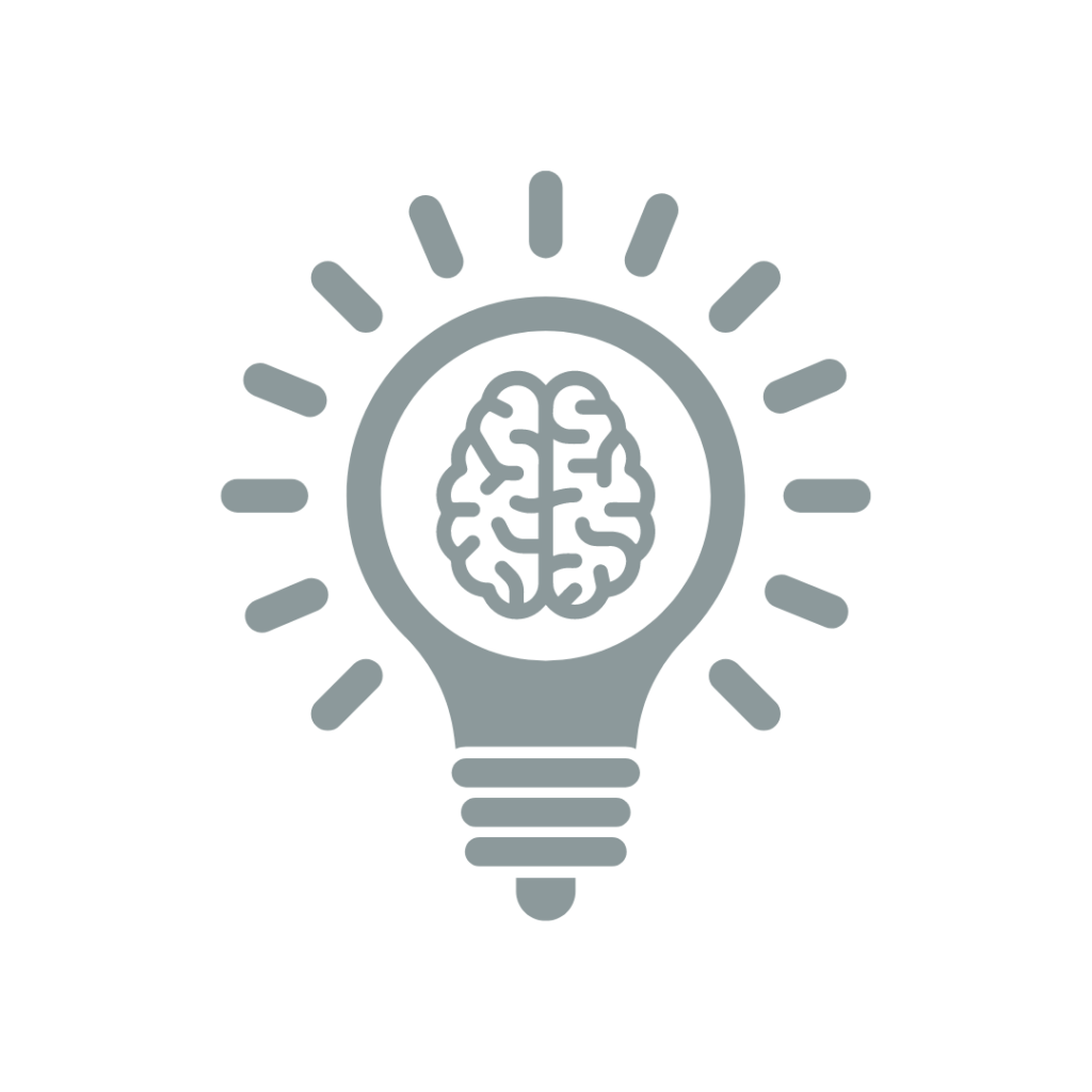 A light bulb with a human brain inside, glowing on a gray background.